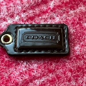 Coach Glossy Brown Leather Tag